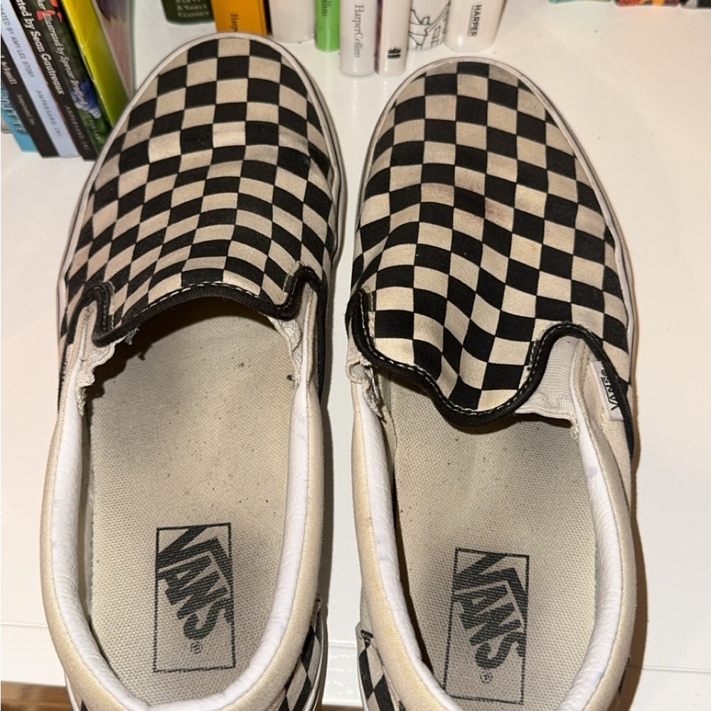 Men’s black and white checkered slip on vans